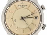 a close up of a wrist watch on a white background