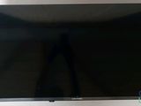 a picture of a flat screen tv sitting on top of a table