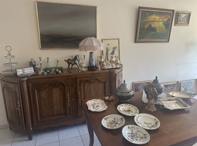a table with a lot of plates on it in a room
