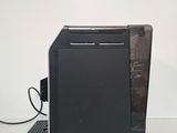 a laptop computer sitting on top of a desk next to a printer