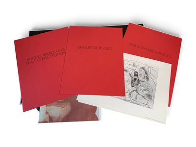 a set of four red books with black and white illustrations on them