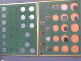 a picture of a picture of a book with coins on it