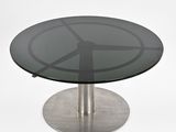 a glass table with a metal base and a peace sign on it