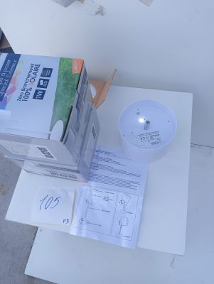 a box on a table with a light on top of it