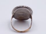 an image of a silver ring with a stone in the middle