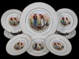 six assiettes sur lesquelles figurent les portraits d'un homme et d'une femme