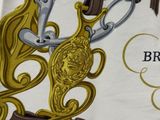a picture of a close up of a brooch with scissors
