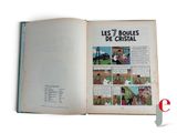 an open book with pictures of people on it