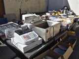 a lot of boxes and a cash register sitting on a table