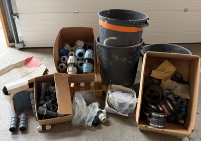 many boxes of assorted items sitting on the floor