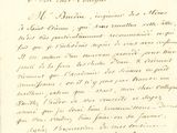 une vieille lettre écrite à la main sur un morceau de papier avec une écriture dessus