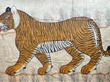une peinture représentant un tigre sur le mur d'un immeuble