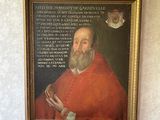 un tableau représentant un homme barbu vêtu d'une robe rouge