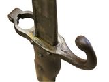 a close up of a metal object with a hook