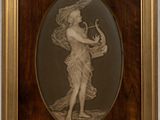 an old picture of a woman holding a harp in a wooden frame