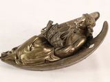 bronze figurine of a sleeping woman on a crescent