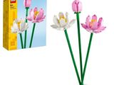 a box of legos and a pink flower in front of it