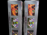 two boxes with pictures of cats on them on a black background