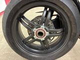 a close up of a motorcycle tire on the ground