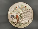 a plate with a picture of a man and a woman on it