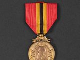 a close up of a medal on a black surface