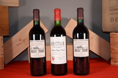 three bottles of wine sitting next to each other on a table