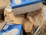 many boxes that are stacked on top of each other in the store