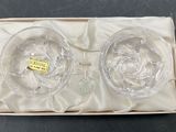 two clear glass bowls in a box on a table