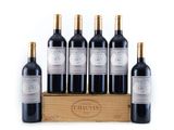 six bottles of red wine in a wooden crate on a white background
