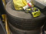a large tire sitting on a pallet in a warehouse