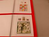 a red binder with a picture of a woman on it