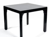 a black table with a black top on a white background