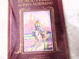 un livre posé sur une table, avec l'image d'un homme à cheval
