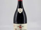 a bottle of red wine with a label on it
