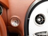 a close up of a steering wheel and dashboard of a car