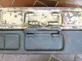 a metal box that has a bunch of keys inside of it