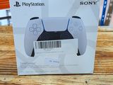 a box with a game controller inside of it on a table