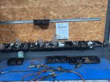 many different types of electrical equipment on the table