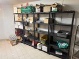 many boxes and boxes on the shelves in the room