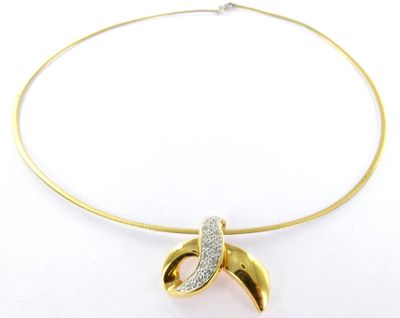 yellow gold plated necklace with a diamond pendant on a white background