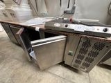 an image of a kitchen with a stove and a dishwasher