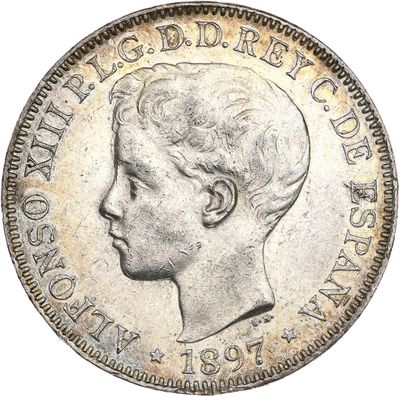 gros plan d'une pièce de monnaie sur laquelle figure une tête d'homme