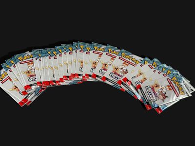 a lot of pokemon cards on a black background