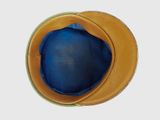 a yellow and blue hat on a white background