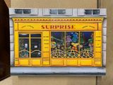 a picture of a painting of a storefront on the wall