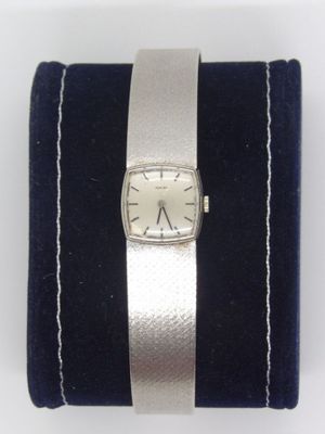 an image of a silver wrist watch with a black velvet band