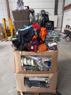 a cart with many items in it in a warehouse