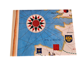 a picture of a map with a compass on it
