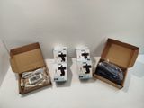 three boxes of nintendo wii controllers sitting next to each other on a white surface