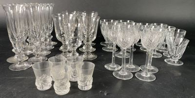 a lot of empty wine glasses on the table